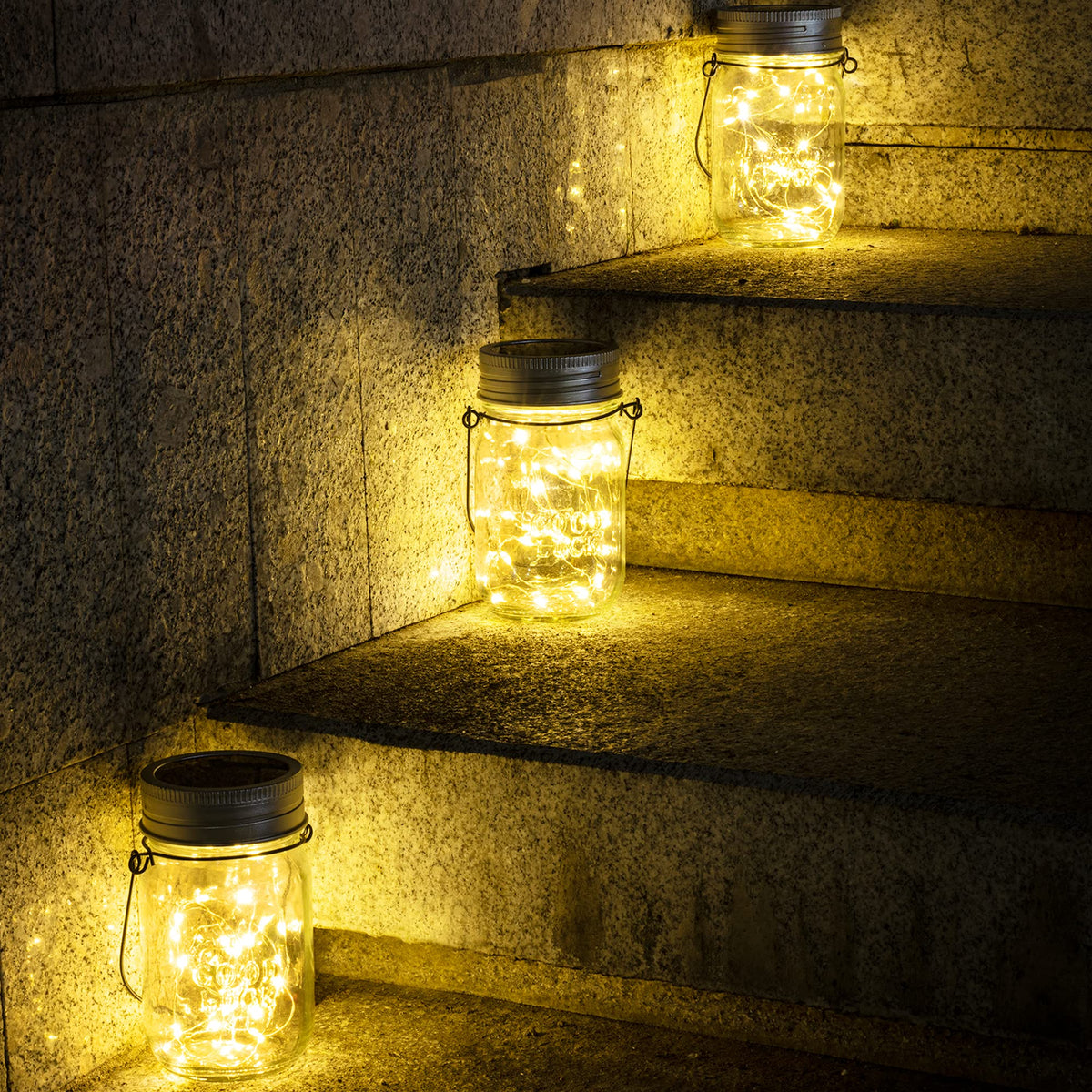 GIGALUMI solar-powered jar lights charge by day and glow at night.