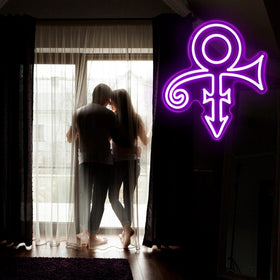 Gippro Prince symbol neon sign serves as a music studio backdrop.