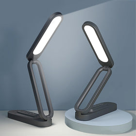 Giryuhd LED desk lamp, foldable and portable for travel and work light.