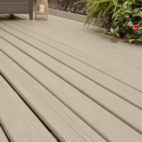 Glidden Easy Application with roller close-up highlights simple DIY porch-floor painting.