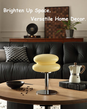 Glivpny lamp on a nightstand creates inviting bedside ambience.