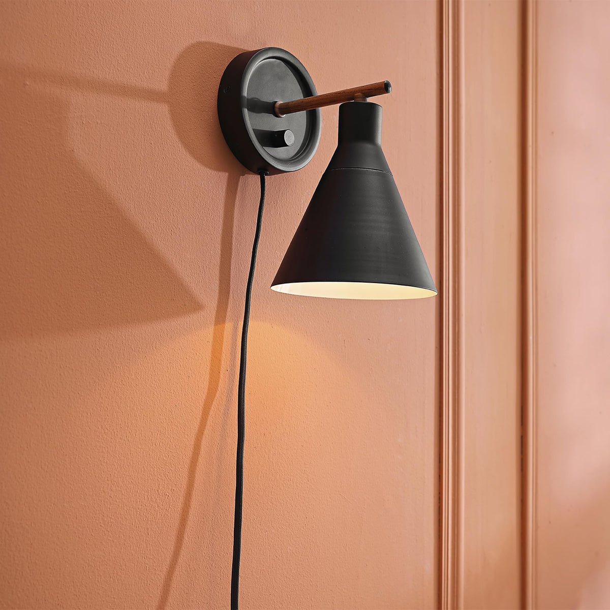 Globe Electric 51725 faux walnut accent offers warm contrast.