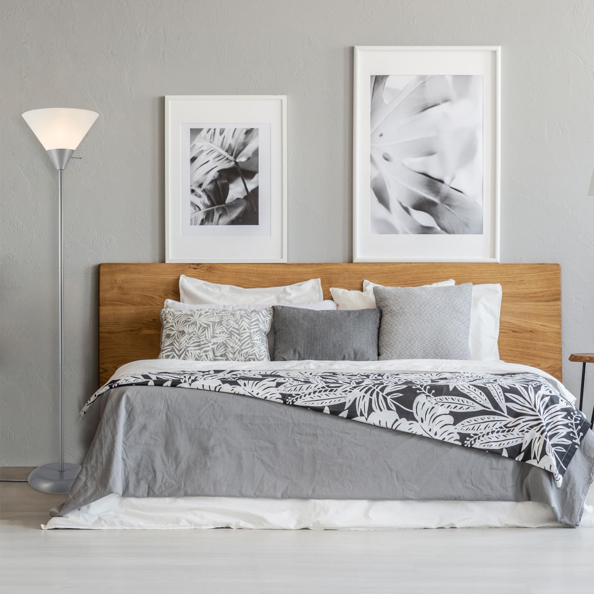 Angled view of Elliott floor lamp showcasing torchiere-style silhouette