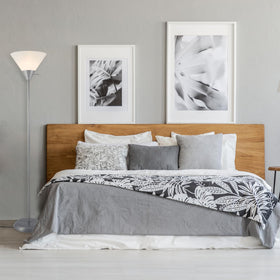 Angled view of Elliott floor lamp showcasing torchiere-style silhouette