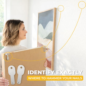 Go Hang It! Pro single-tooth hangers guide precise nail placement
