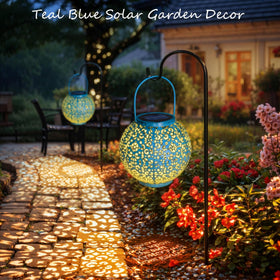 Go2garden lantern glowing at dusk to create warm outdoor ambiance