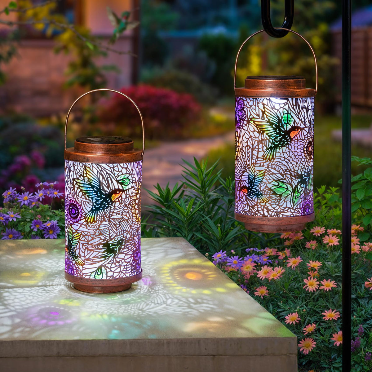 Go2garden hummingbird lanterns 2-pack glow for outdoor decor and ambience.