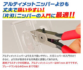 God Hand PN-120 flat thin blades closeup for clean cuts on models.