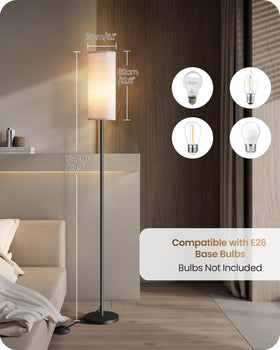 Goebleson beige linen shade floor lamp adds warm ambience to living spaces.