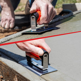Goldblatt concrete finishing tool in action on a curb edge