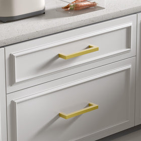 Goldenwarm brushed brass drawer handle adding sleek hardware to a drawer
