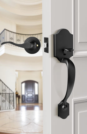 Goldenwarm matte black exterior door handle mounted on a door in situ.