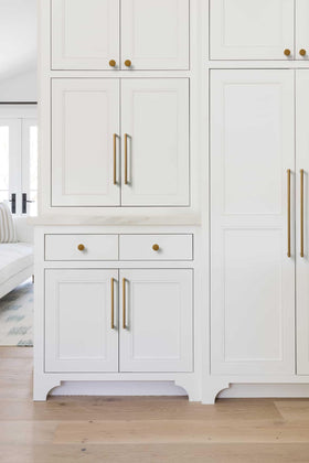 Goo-Ki antique brass knob on a drawer updates style effortlessly.