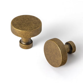 Goo-Ki antique brass knob front view adds timeless style and durability.