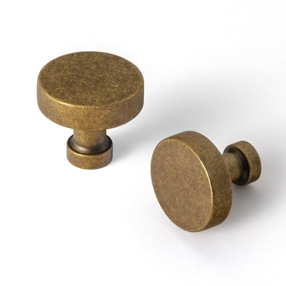 Goo-Ki antique brass knob front view adds timeless style and durability.
