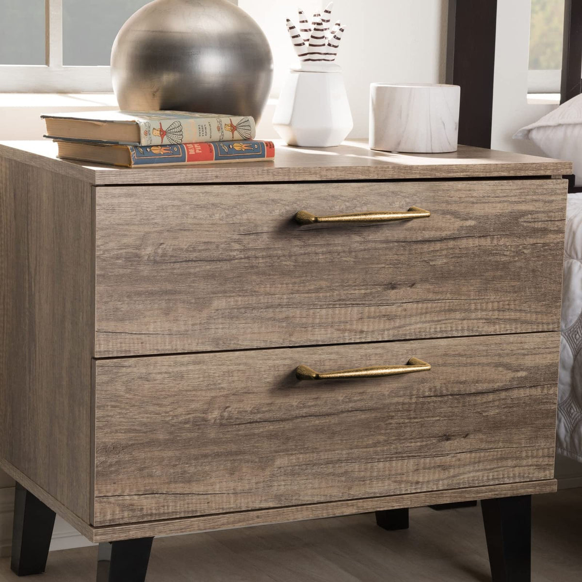Goo-Ki vintage brass cabinet handle side view shows comfortable grip on drawers.