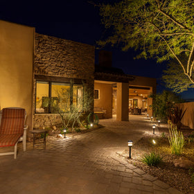 GOODSMANN warm white outdoor light creates inviting nighttime ambiance along walkways.