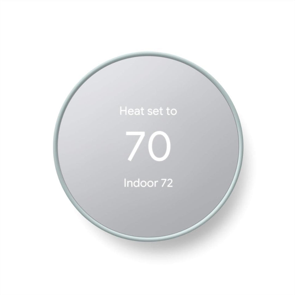 Google Nest Thermostat Fog front view illustrates a sleek, energy-saving control.
