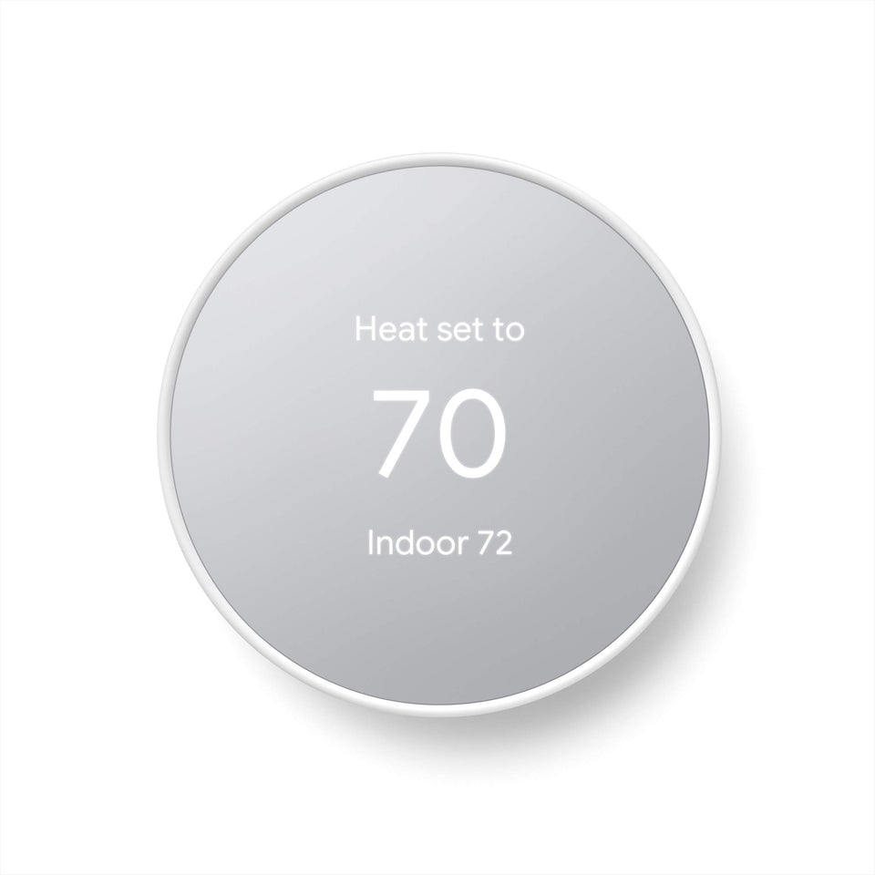 Google Nest Thermostat Snow mounted on wall for simple temperature control.