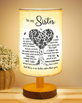 Gorgifty Sisters lamp base glows softly, ideal for a cozy bedside light.