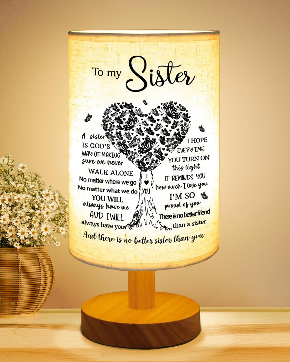 Gorgifty Sisters lamp base glows softly, ideal for a cozy bedside light.