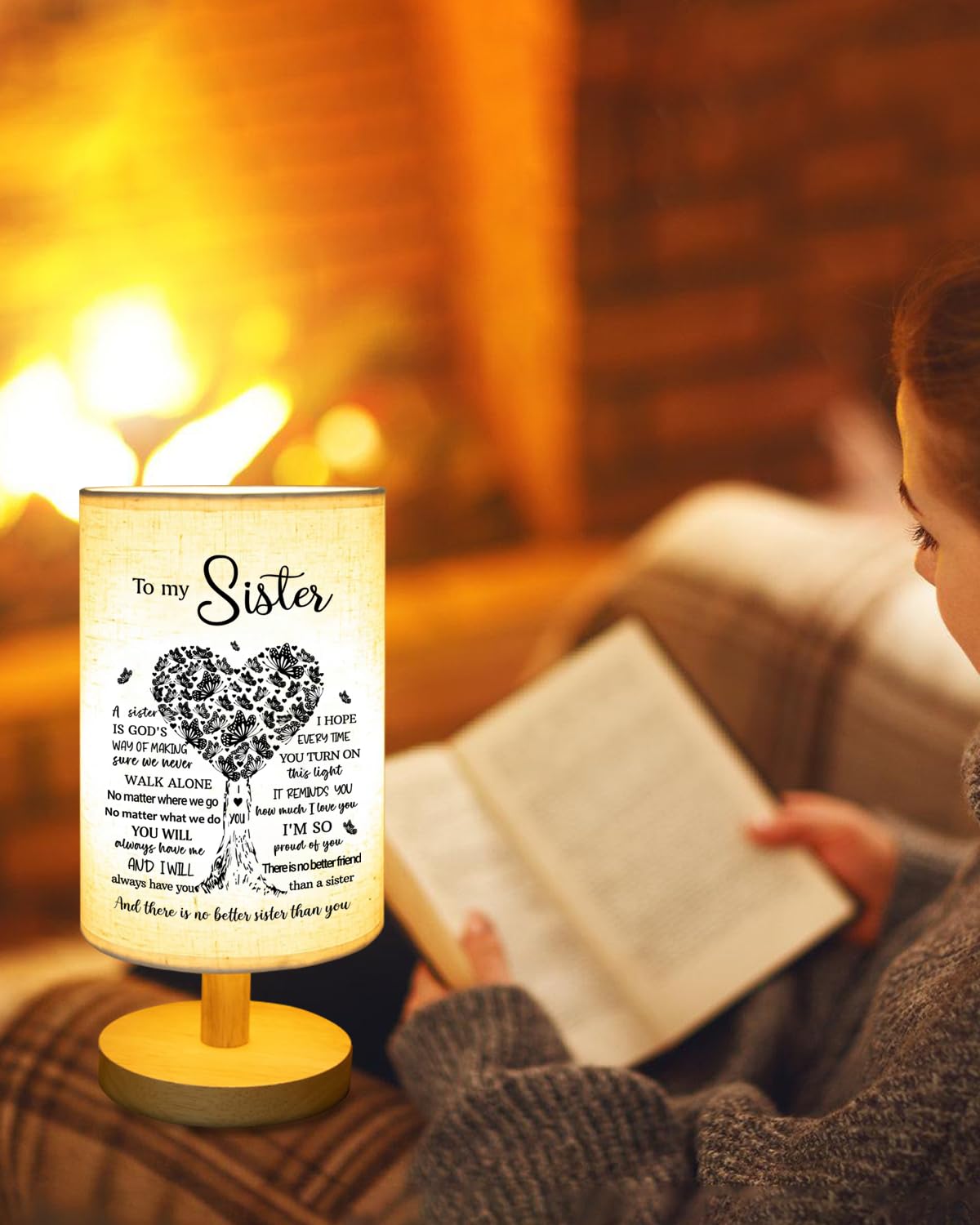 Gorgifty Sisters lamp emits warm LED light for reading in the bedroom.