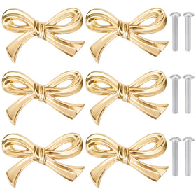 Gosknor Bow Shape Brass Cabinet Knob on a warm gold finish for cabinets