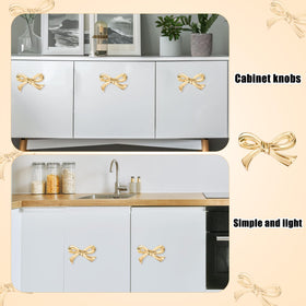 Gosknor Gold Bow Drawer Knob highlighting smooth glossy surface