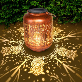 GOTOME Owl Solar Lantern hanging outdoors at dusk creates whimsical garden ambiance.