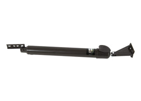 Greenstar Touch 'n Hold smooth door closer bronze body shown on weather-ready door for durability