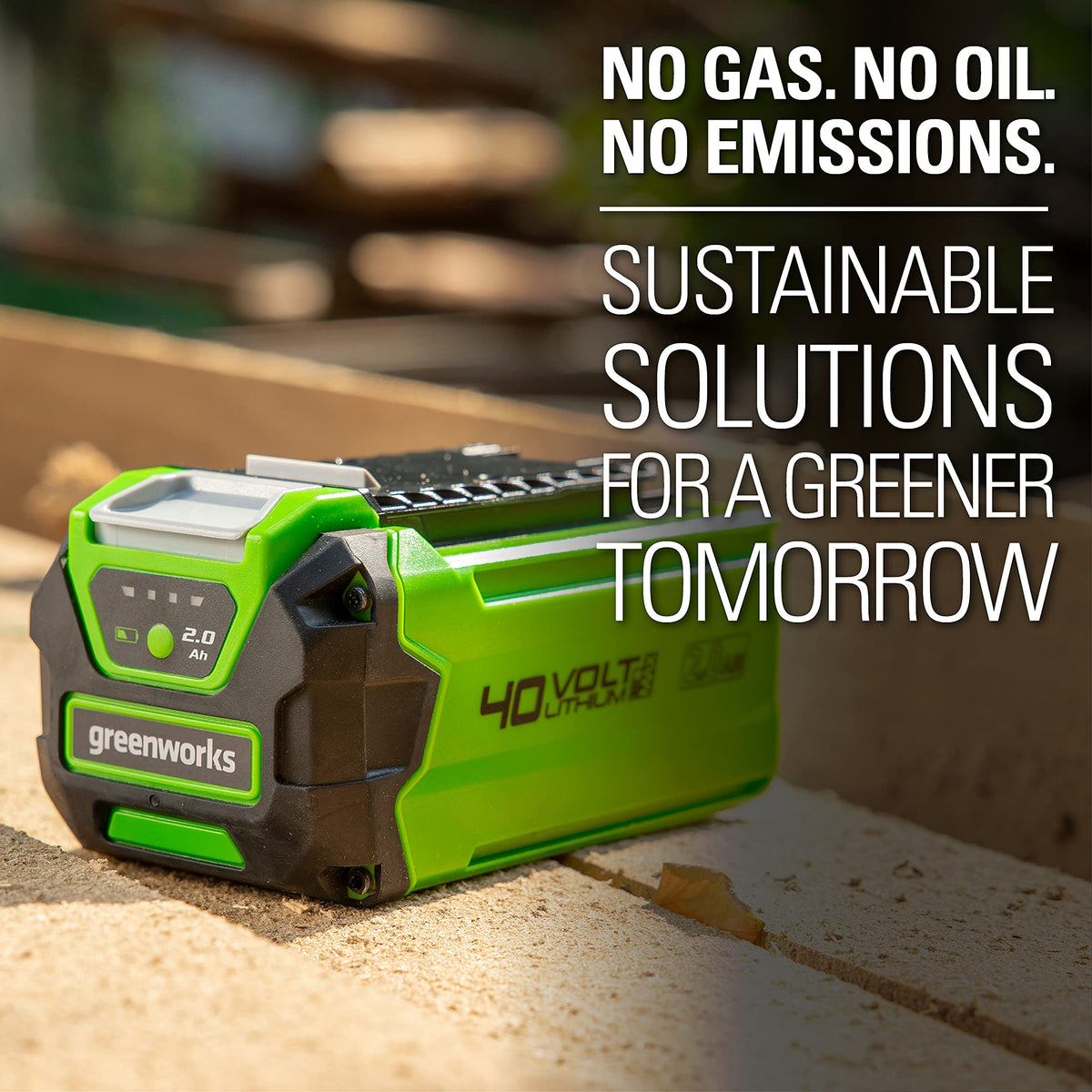 Greenworks GMAX 40V battery in-use during mowing and edging tasks.