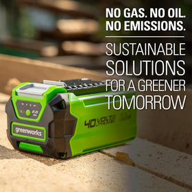 Greenworks GMAX 40V battery in-use during mowing and edging tasks.