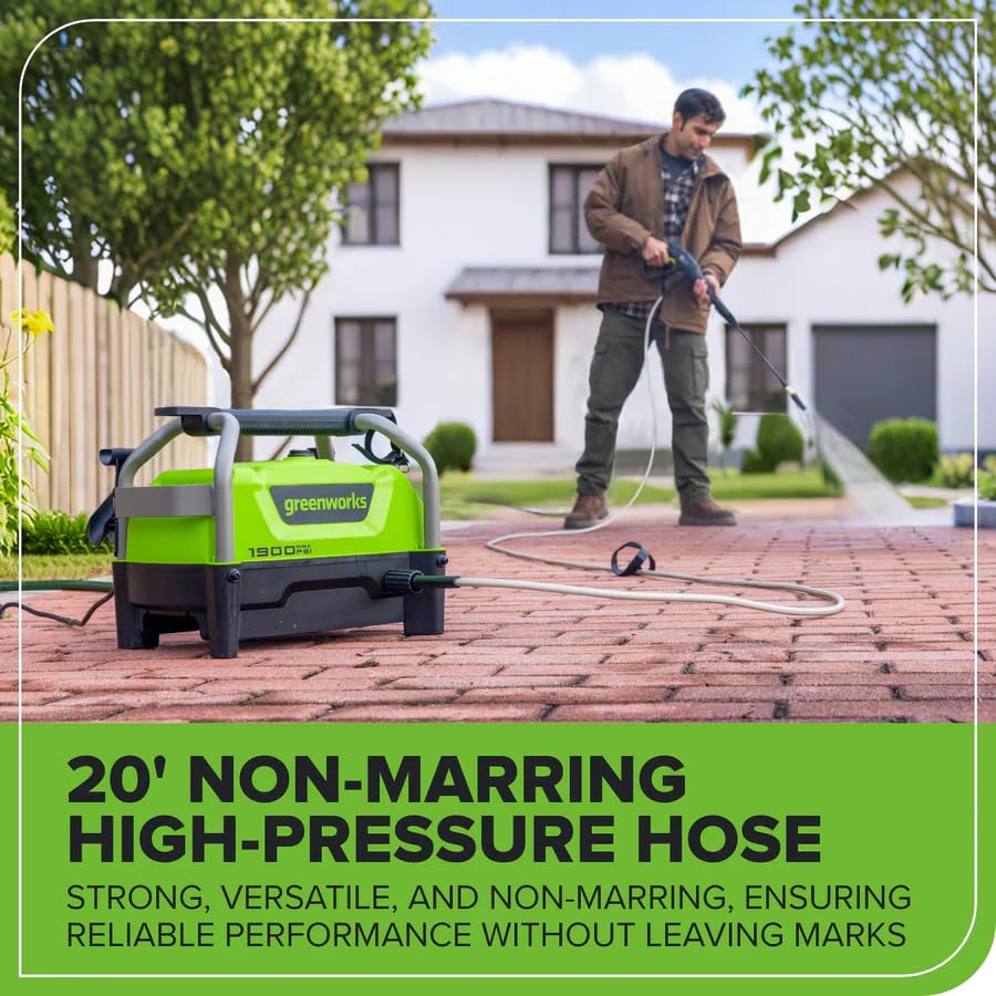 Greenworks pressure washer in use for car cleaning outdoors.