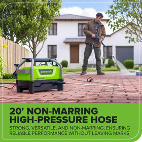 Greenworks pressure washer in use for car cleaning outdoors.