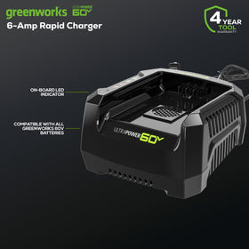 Greenworks Pro 60V charger docked with battery for convenient charging.