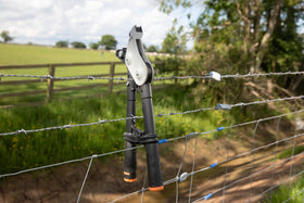 GRIPPLE Torq Tool caption showing cable tensioning in a garden setup.