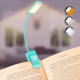 Gritin 9-led book light clipped onto a page for hands-free reading