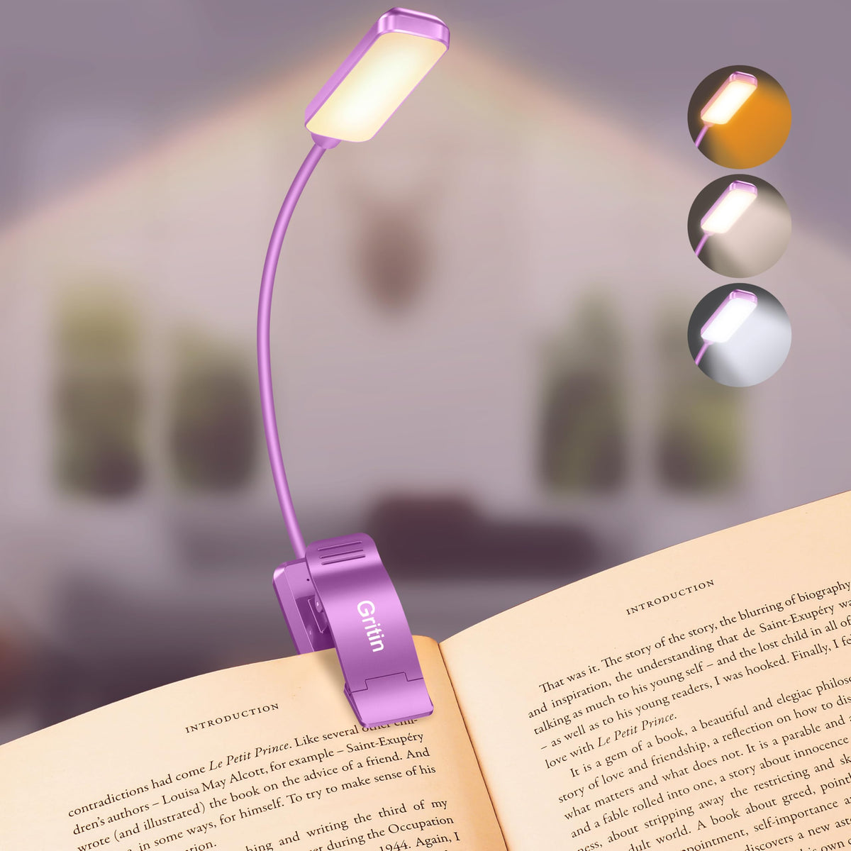 Gritin 9 LED book light clipped on a page for focused reading.