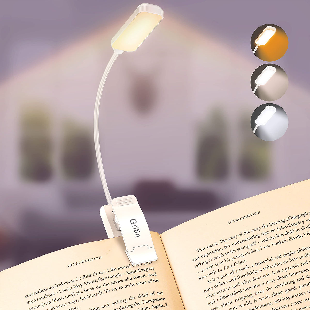 Gritin 9-LED rechargeable book light clipped on a page for easy reading.