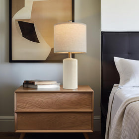 G-SAFAVA morning light filters through linen shade on desk