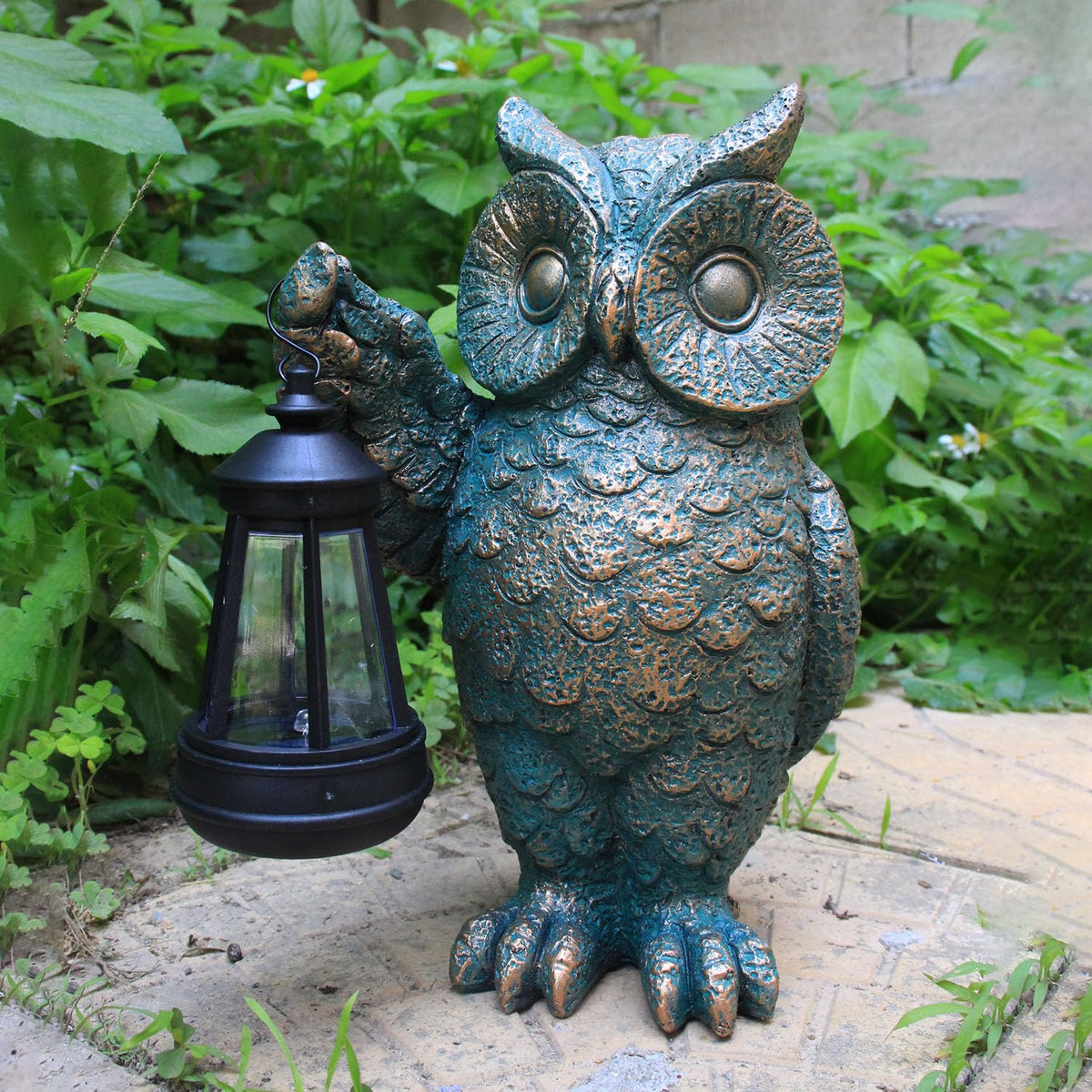 GUANFU owl statue right talon holds LED lantern for whimsical yard accents.