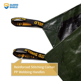 GUARD SHIELD debris removal tarp laid out for tidy yard waste pickup.