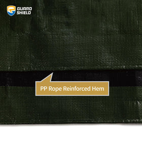 GUARD SHIELD rugged outdoors tarp resists wet conditions during cleanup.