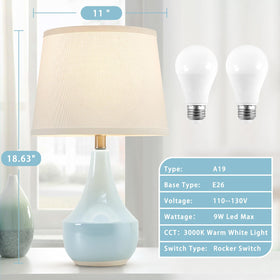 GyroVu bedside lamp with fabric shade provides soft warm light for cozy reading.