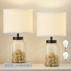 GyroVu fillable table lamp with clear glass base for seashell decor.