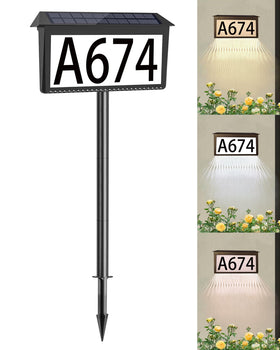 HAHOME solar house numbers mounted on a wall, bright nighttime visibility