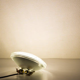 Haian Support PAR36 LED bulb emits warm white 3000K glow.