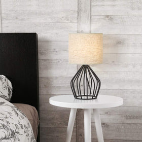 HAITRAL black chrome metal lamp adds durable style to any nightstand.