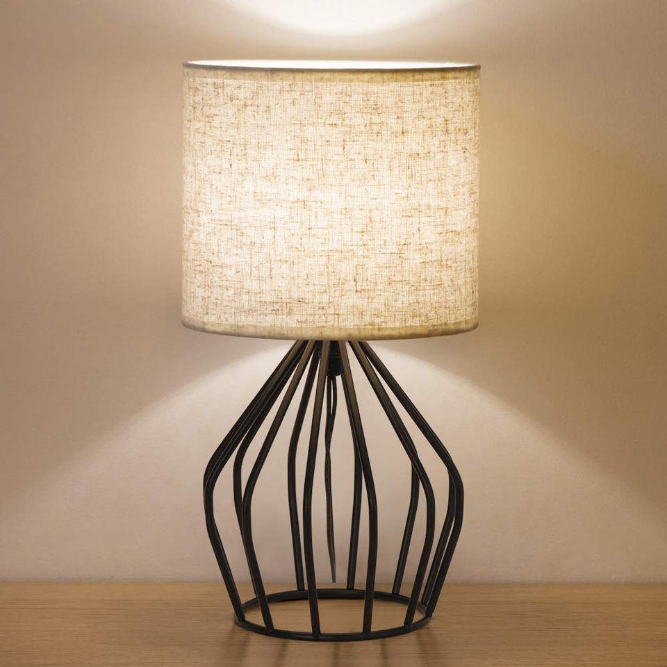 HAITRAL black modern table lamp with linen shade enhances any desk with ambient light.
