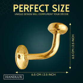 HANDLUX unlacquered brass wall hooks mounted in entryway, blend of vintage charm